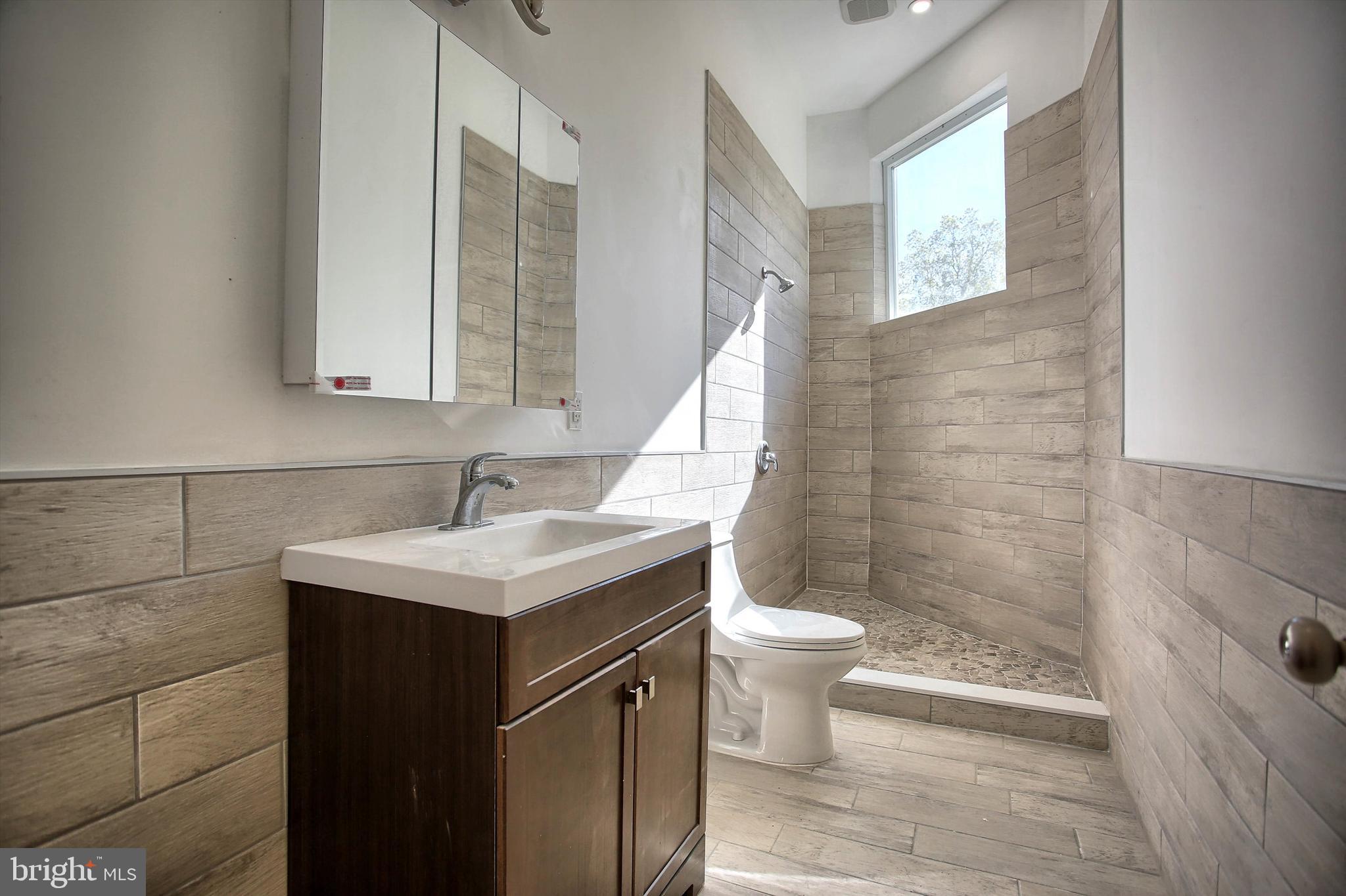 1813 Holly Drive Harrisburg, PA 17110 - Photo 34 of 61 a bathroom with a sink toilet and shower