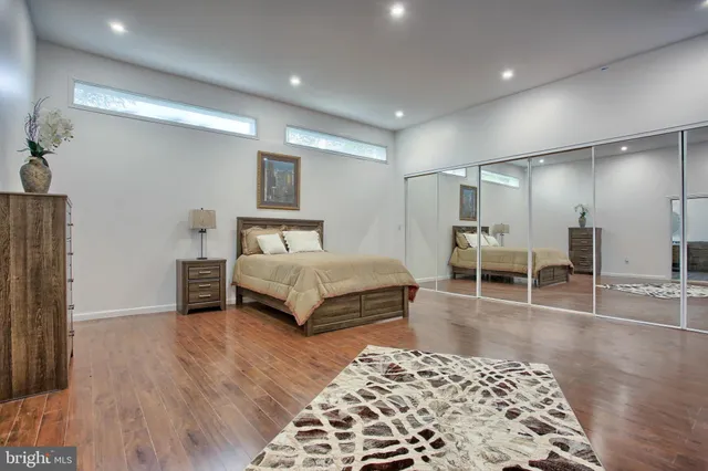 a view of a livingroom with furniture and chandelier