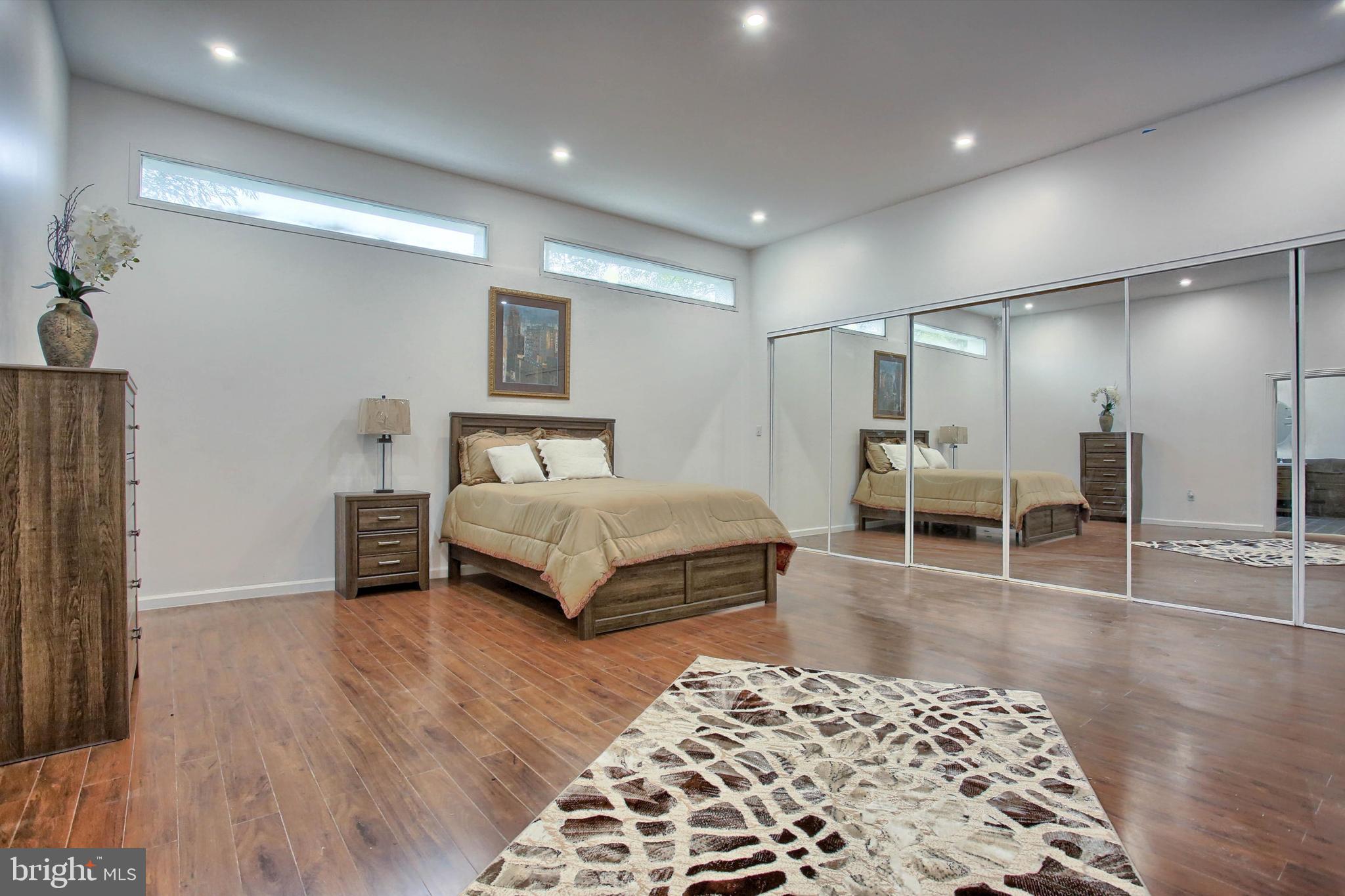 1813 Holly Drive Harrisburg, PA 17110 - Photo 41 of 61 a bedroom with furniture and a wooden floor