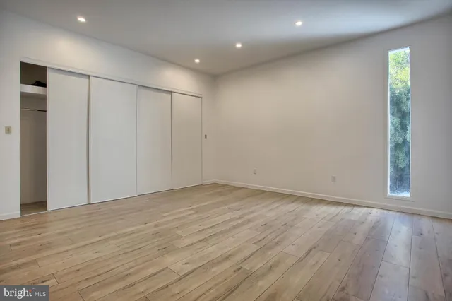 a view of a room with rack on the wall