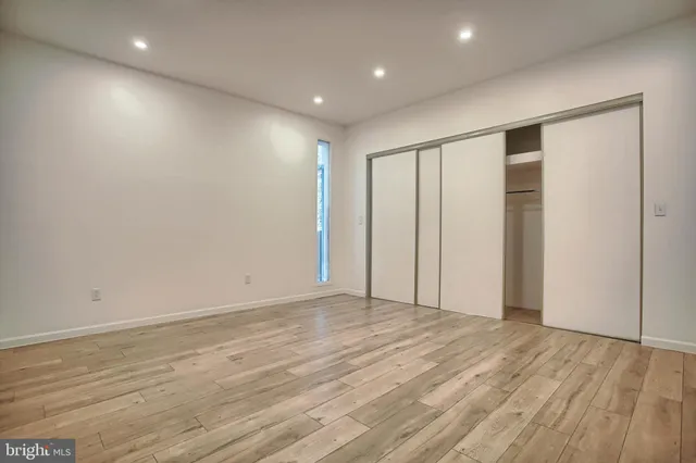 a view of a house with a yard and garage