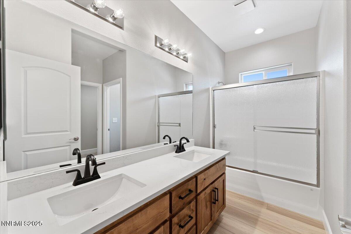 815 Great Basin Lane Fallon, NV 89406 - Photo 31 of 49 a bathroom with a sink double vanity and a mirror