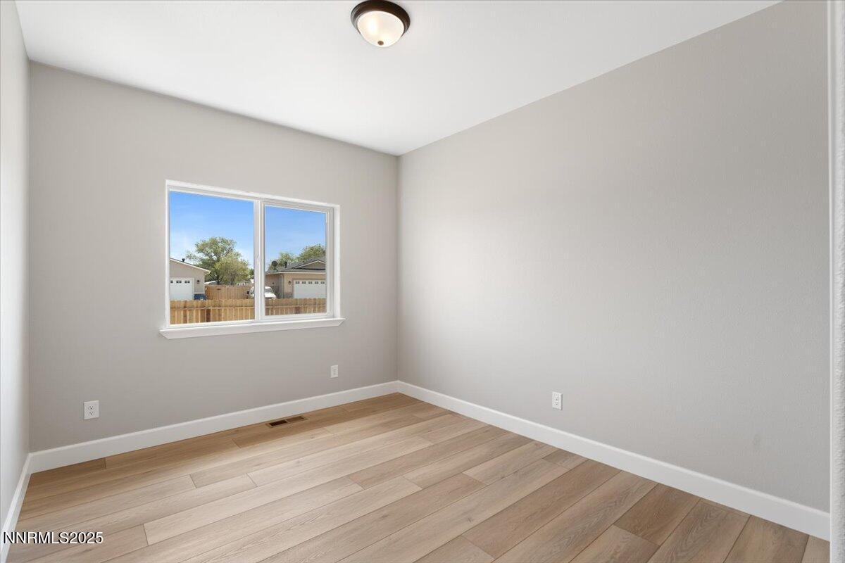 815 Great Basin Lane Fallon, NV 89406 - Photo 33 of 49 an empty room with a window