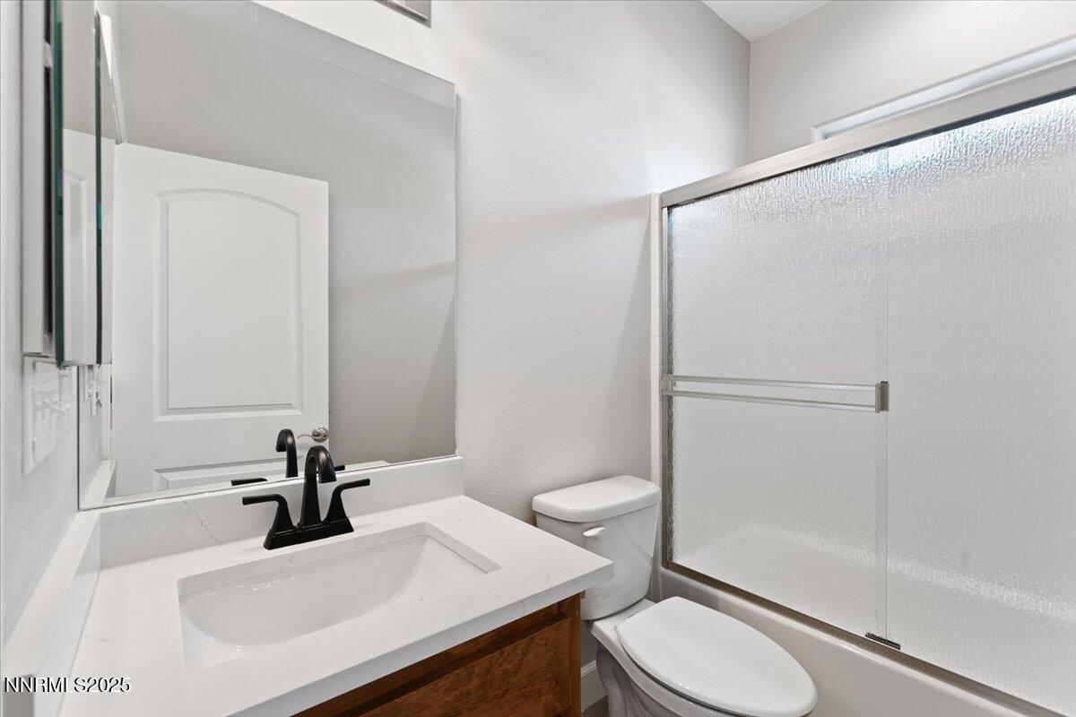 815 Great Basin Lane Fallon, NV 89406 - Photo 36 of 49 a bathroom with a sink toilet and shower