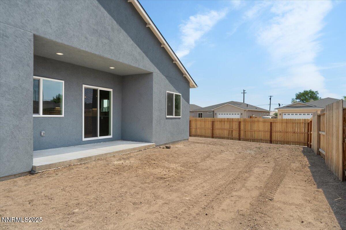 815 Great Basin Lane Fallon, NV 89406 - Photo 44 of 49 a view of an house with backyard and plants