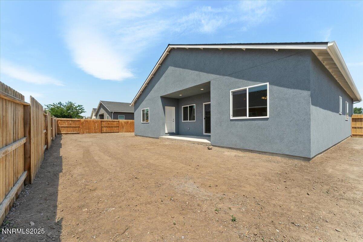 815 Great Basin Lane Fallon, NV 89406 - Photo 45 of 49 a backyard of a house with wooden fence