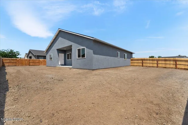 a view of backyard of house