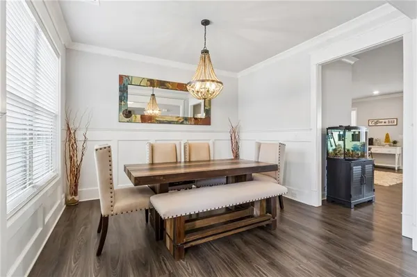 a view of room with furniture and chandelier
