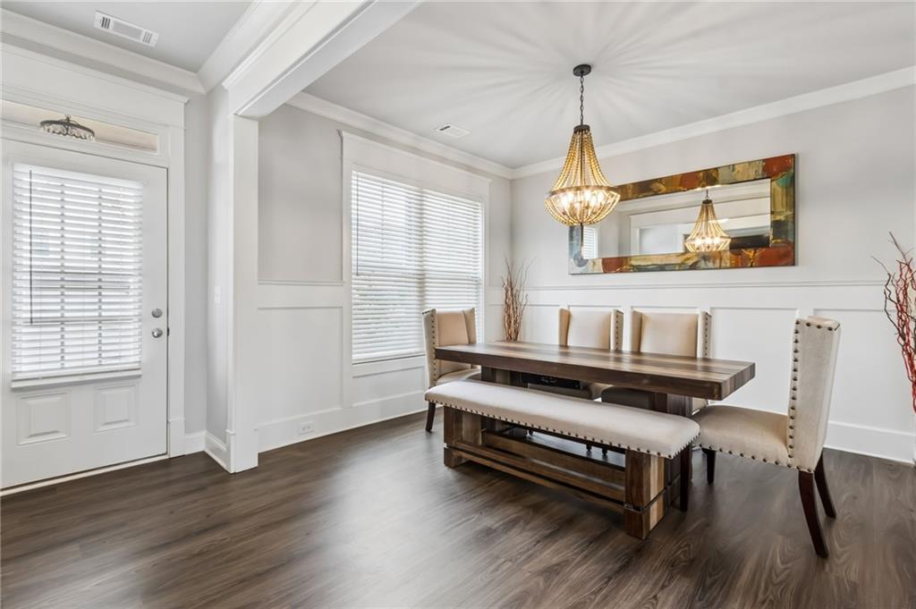 4417 Chestnut Oak Way Gainesville, GA 30504 - Photo 16 of 63 a living room with wooden floor furniture and a window