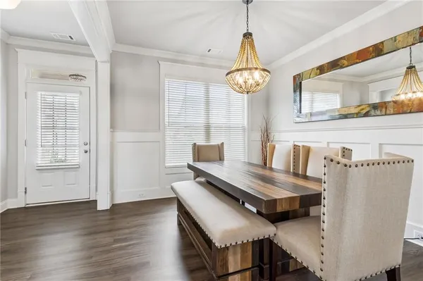 a living room with fireplace furniture and a flat screen tv