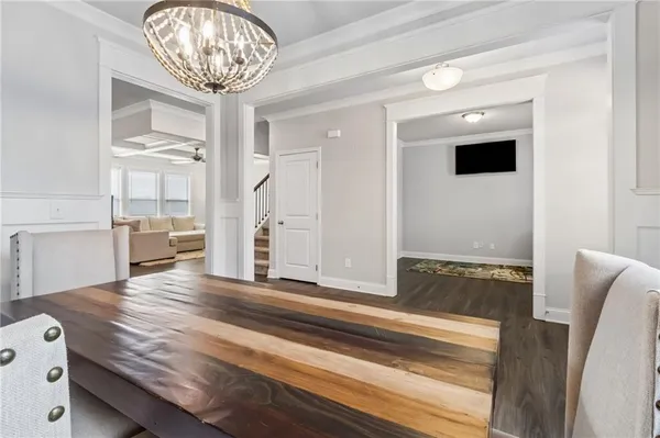 a living room with a flat screen tv and a fireplace