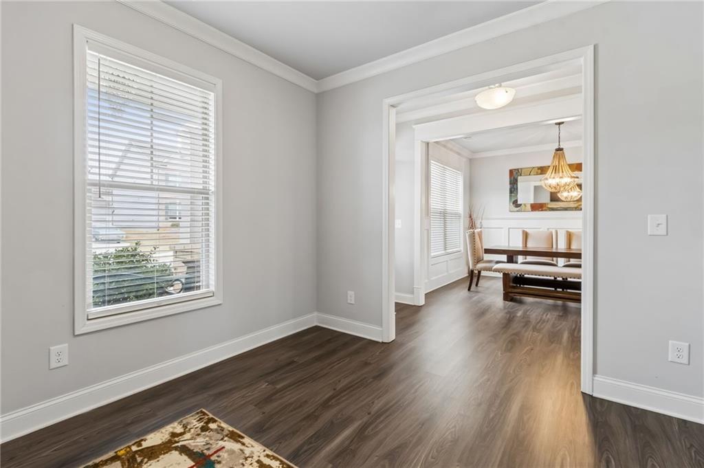 4417 Chestnut Oak Way Gainesville, GA 30504 - Photo 21 of 63 a view of a livingroom with wooden floor and a window