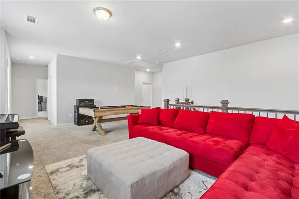 a bed room with a bed and a lamp