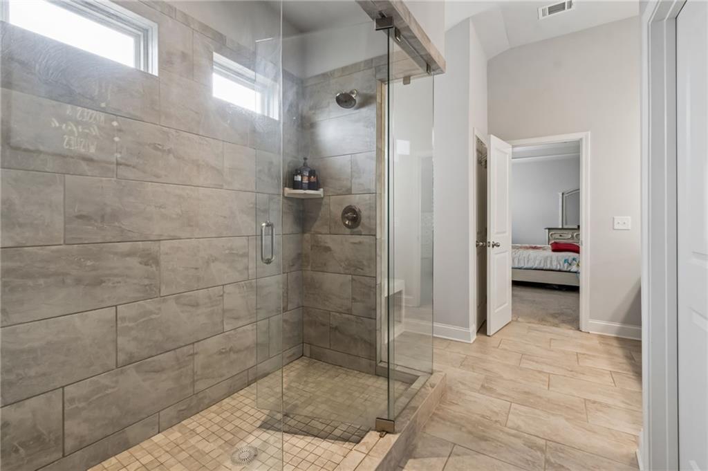 4417 Chestnut Oak Way Gainesville, GA 30504 - Photo 47 of 63 a bathroom with a shower and a sink