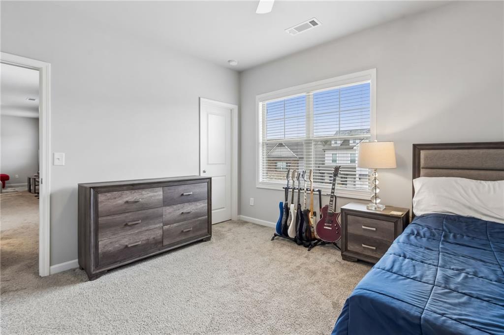 4417 Chestnut Oak Way Gainesville, GA 30504 - Photo 50 of 63 a bed room with a bed and a window