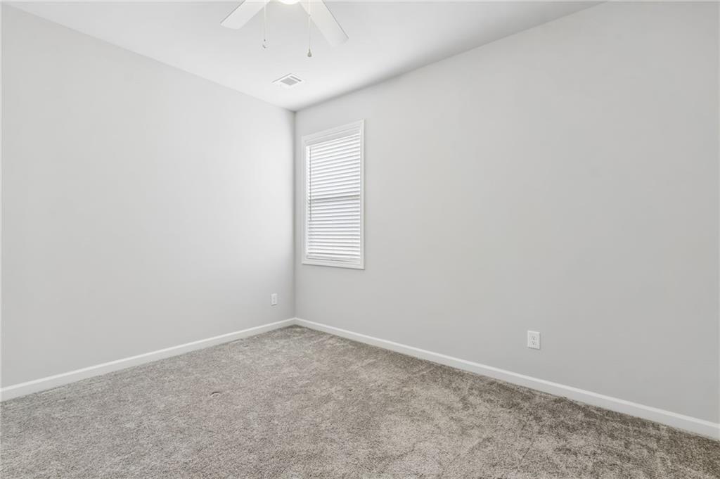 4417 Chestnut Oak Way Gainesville, GA 30504 - Photo 58 of 63 an empty room with a empty space and a window