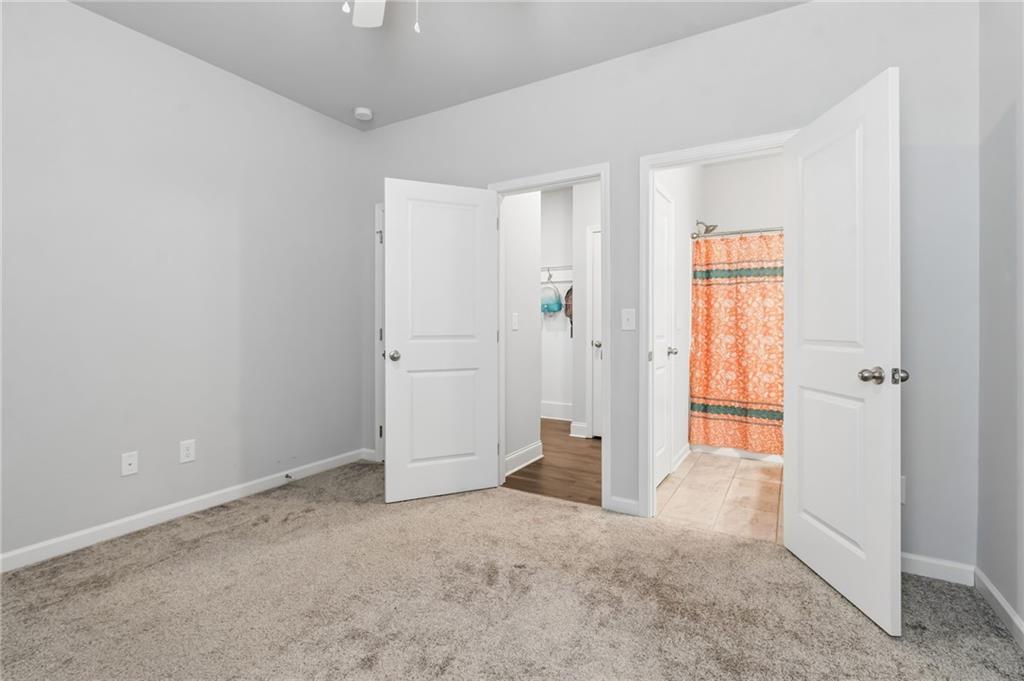 4417 Chestnut Oak Way Gainesville, GA 30504 - Photo 60 of 63 an empty room with windows and closet
