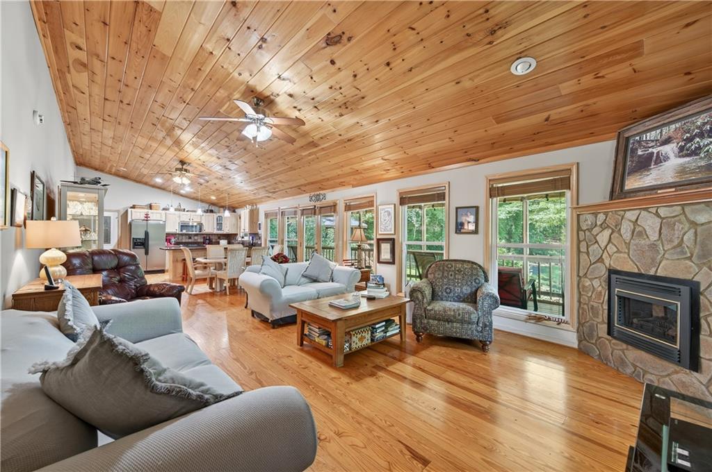200 Bahn Innsbruck Helen, GA 30545 - Photo 11 of 27 a living room with furniture fireplace and a large window