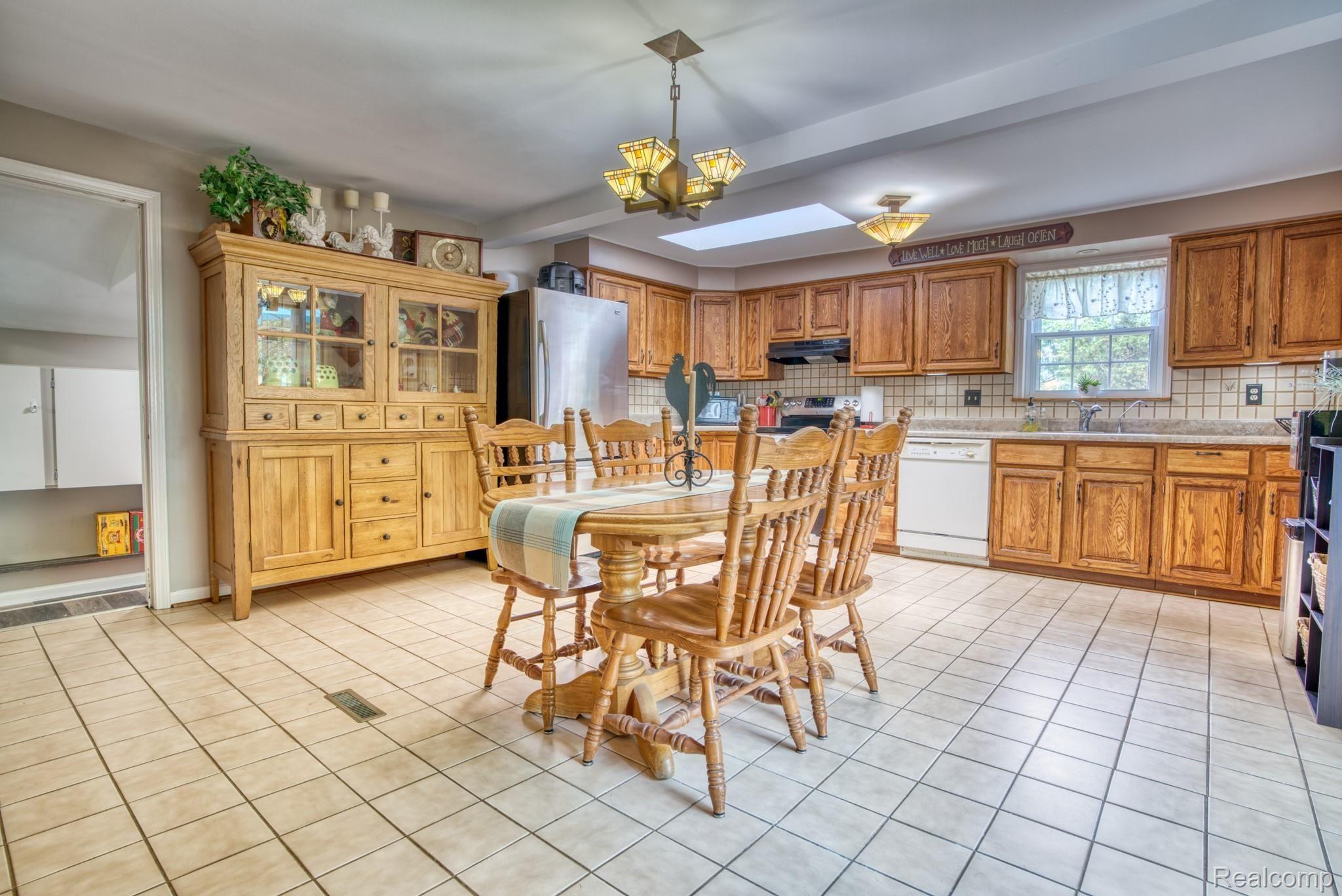 4065 Jewell Road Howell, MI 48843 - Photo 9 of 62 KITCHEN AREA. CERAMIC FLOORING AND BACK SPLASH