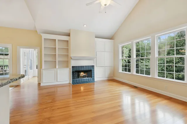 a view of a living room and kitchen
