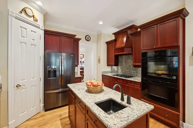 a spacious bathroom with a double vanity sink and a mirror