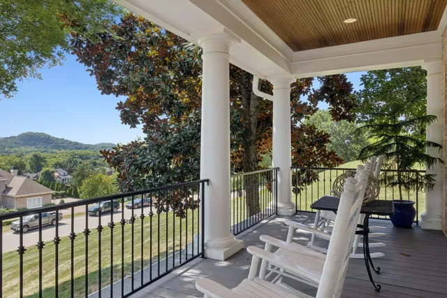 a living room with furniture fireplace and flat screen tv