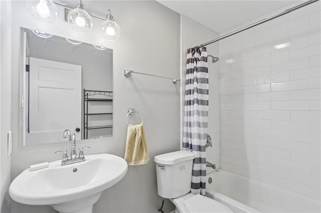 2772 Clearview Road Allison Park, PA 15101 - Photo 25 of 43 a bathroom with a sink a toilet and shower