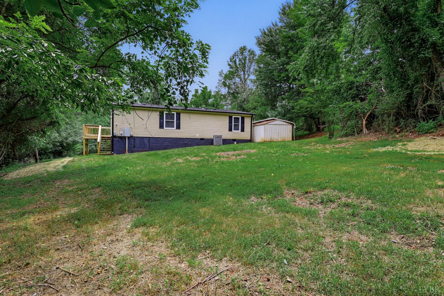 304 Ridgelake Road Goodview, VA 24095 - Photo 25 of 29 a house view with a garden space