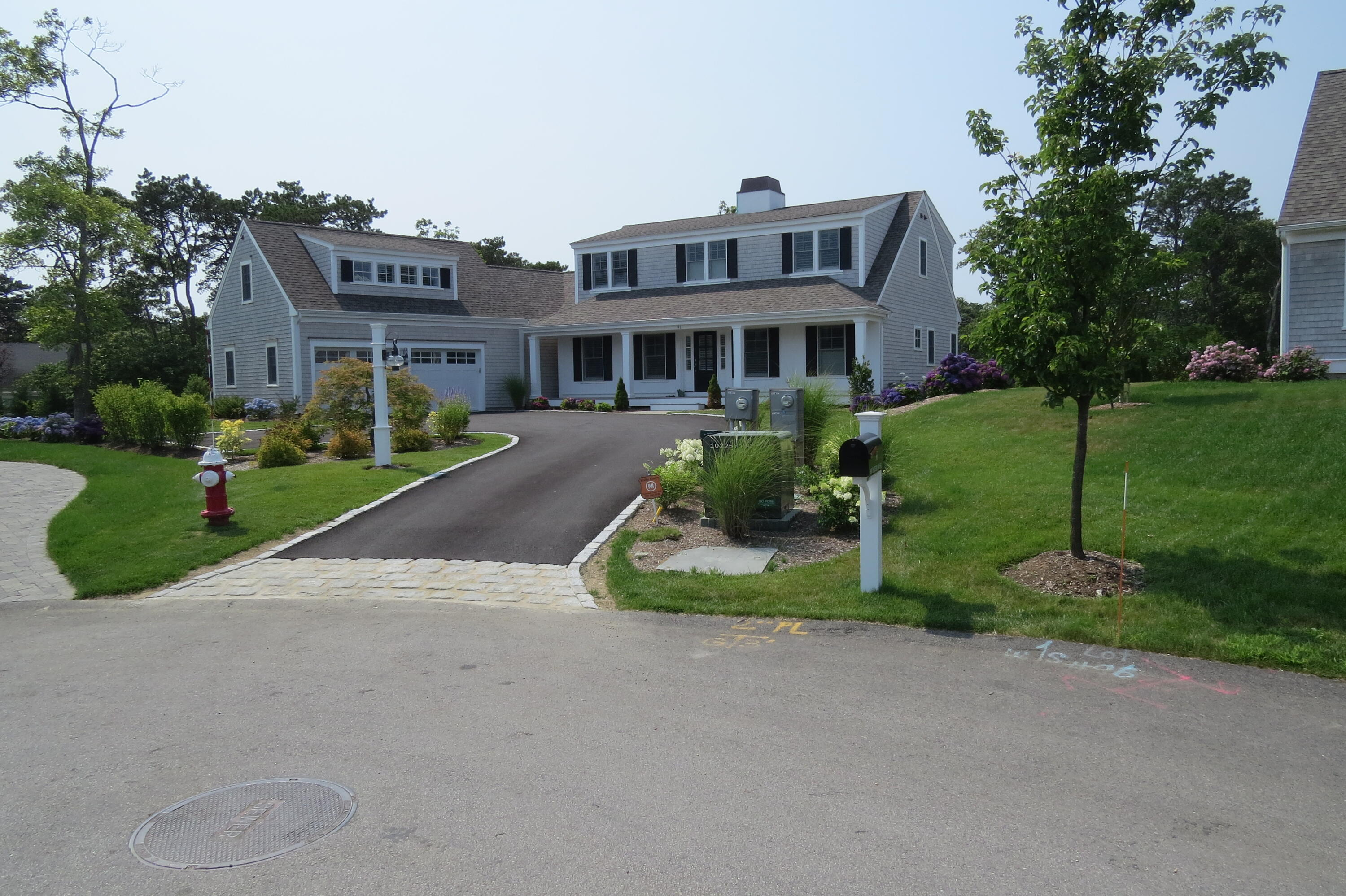 96 Hunter Rise Chatham, MA 02633 - Photo 1 of 37 a front view of house with yard and green space