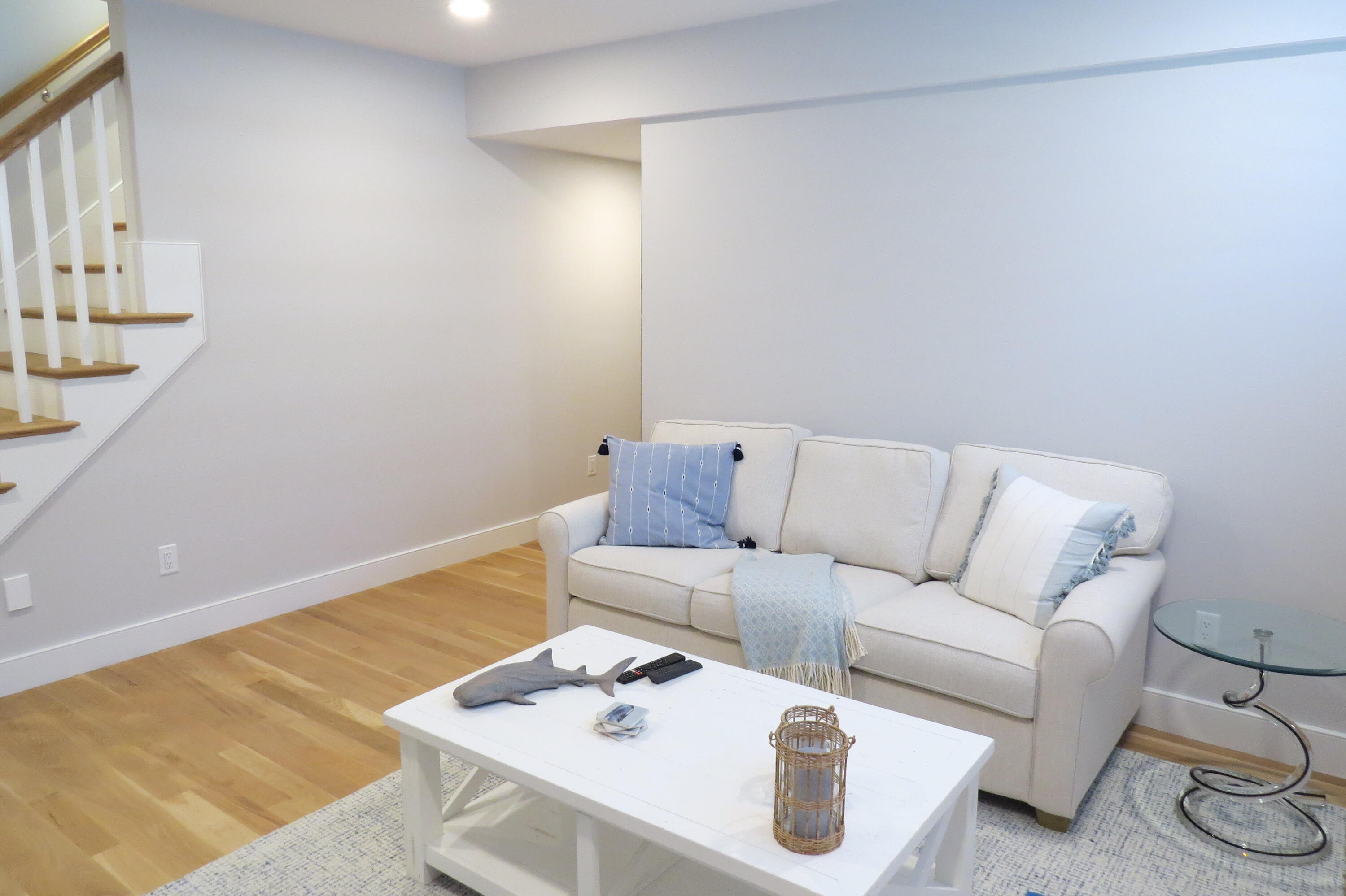 96 Hunter Rise Chatham, MA 02633 - Photo 12 of 37 a living room with furniture and a wooden floor