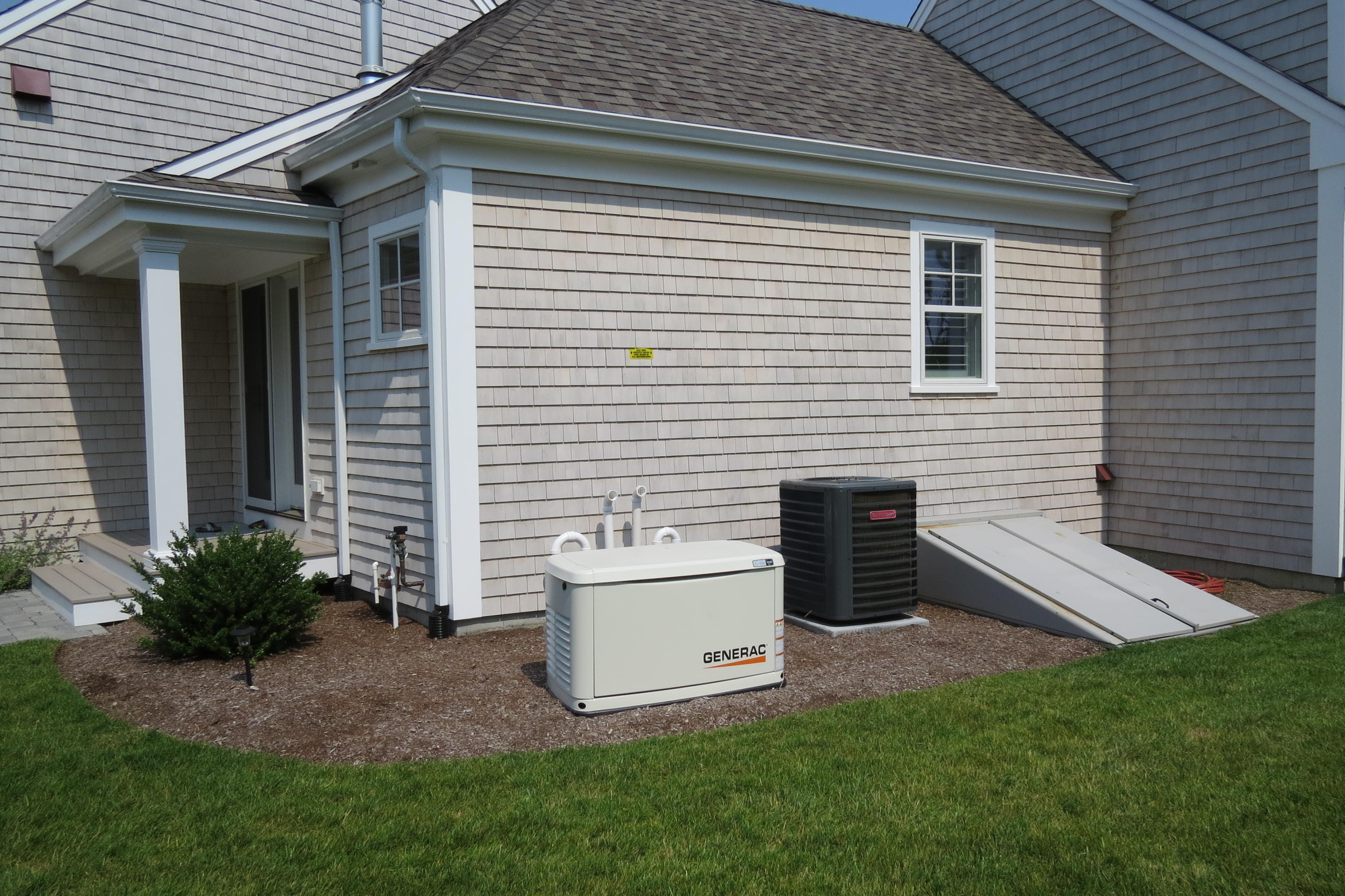 96 Hunter Rise Chatham, MA 02633 - Photo 24 of 37 a front view of a house with a garden