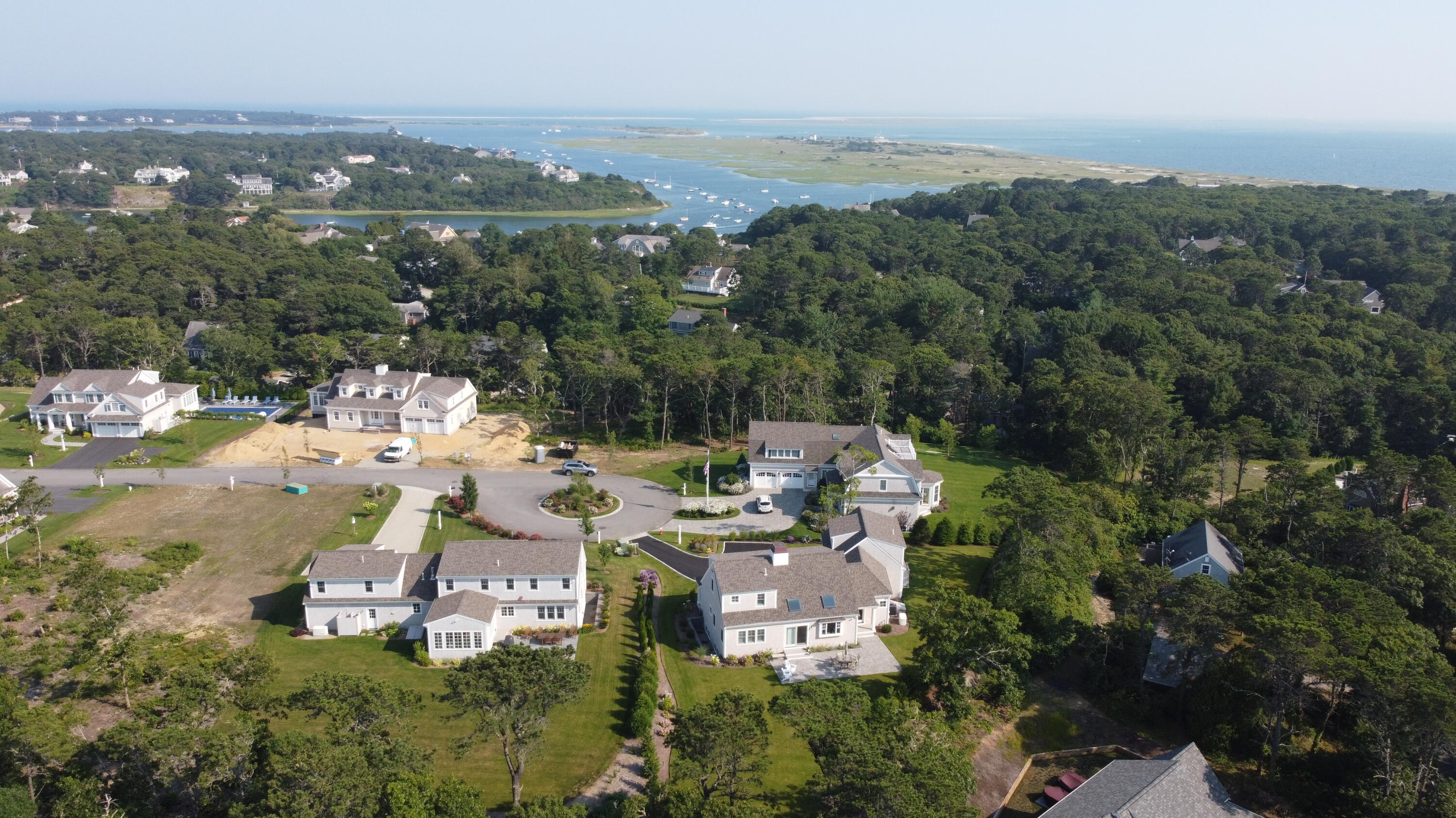 96 Hunter Rise Chatham, MA 02633 - Photo 29 of 37 an aerial view of a house with a garden and lake view