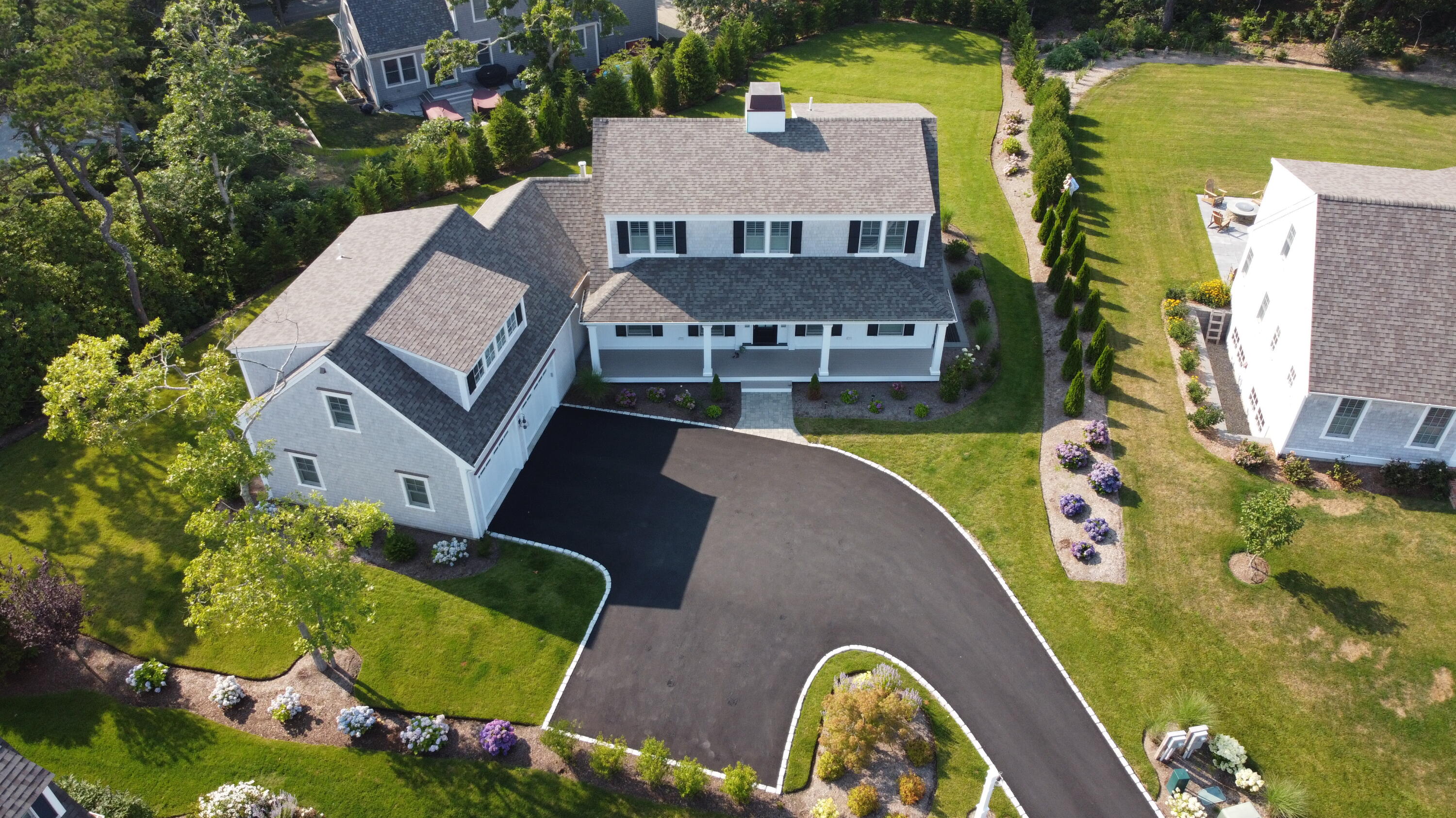 96 Hunter Rise Chatham, MA 02633 - Photo 30 of 37 an aerial view of a house with swimming pool having outdoor seating
