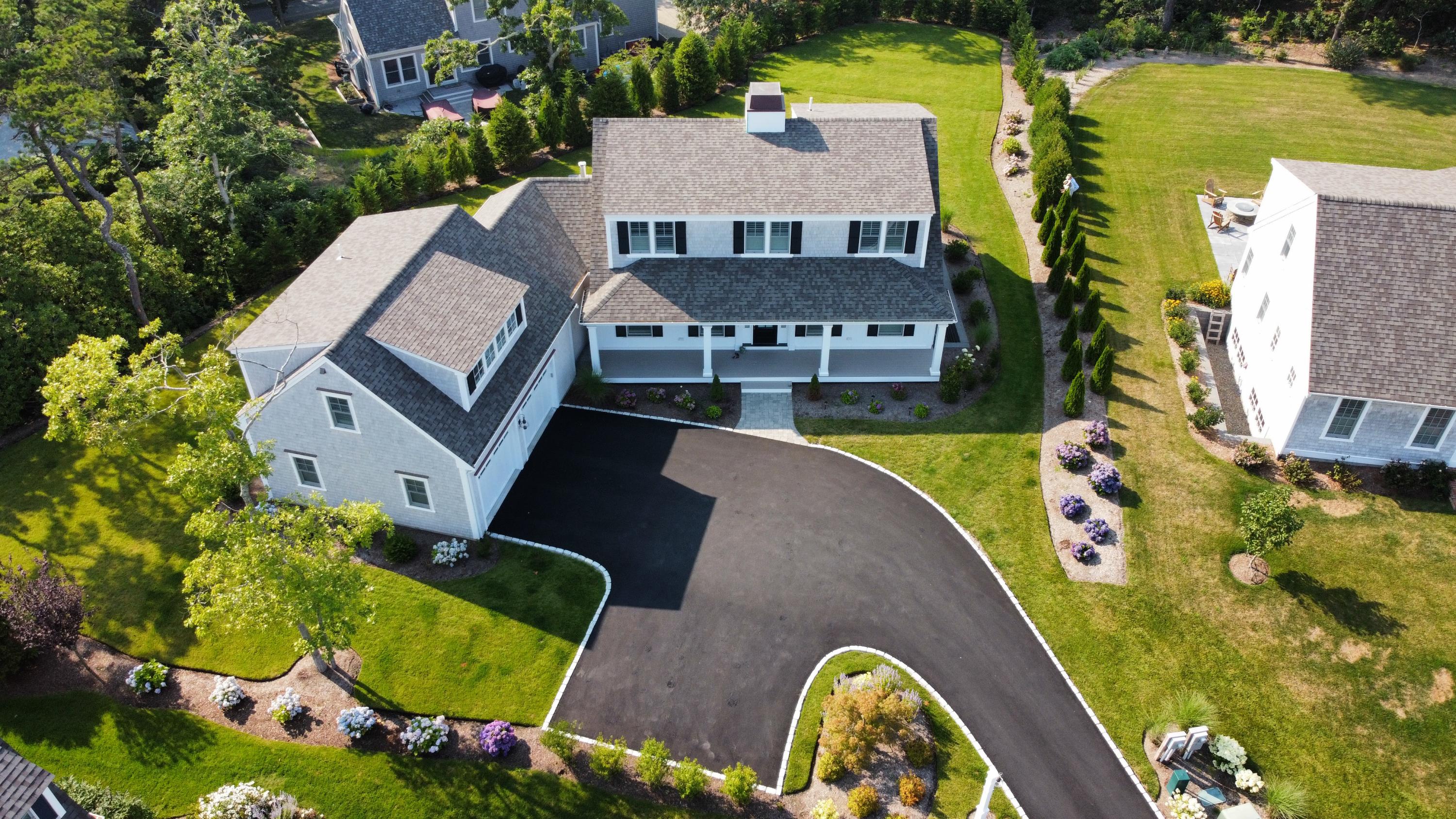 96 Hunter Rise Chatham, MA 02633 - Photo 32 of 37 an aerial view of a house with swimming pool having outdoor seating