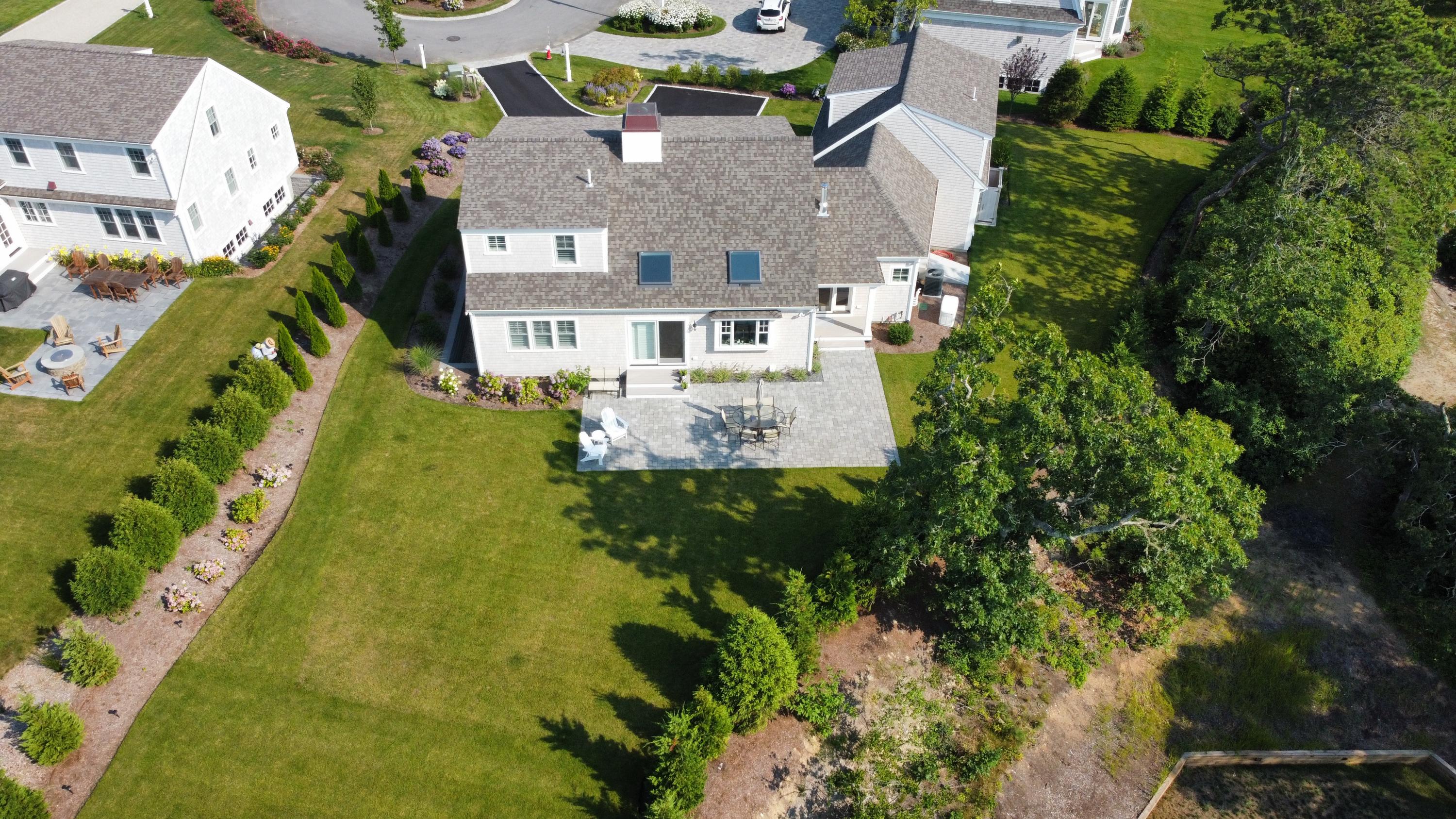 96 Hunter Rise Chatham, MA 02633 - Photo 33 of 37 an aerial view of a house with a yard