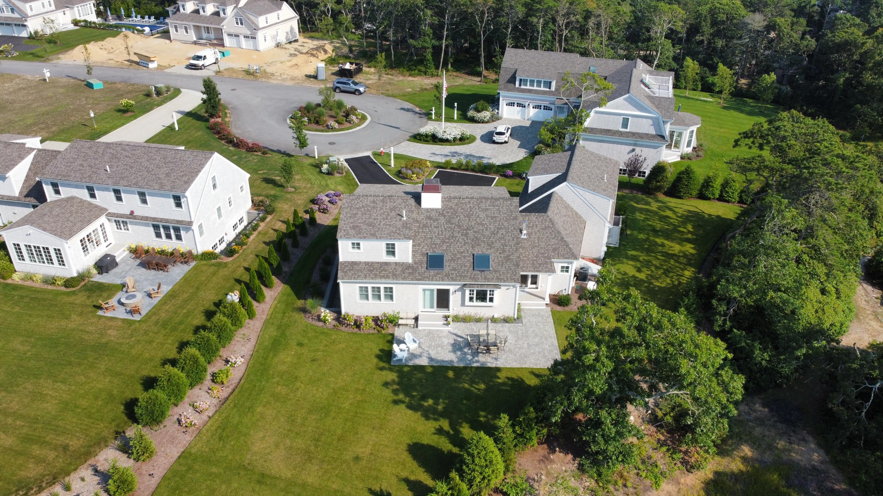96 Hunter Rise Chatham, MA 02633 - Photo 34 of 37 an aerial view of multiple houses with yard