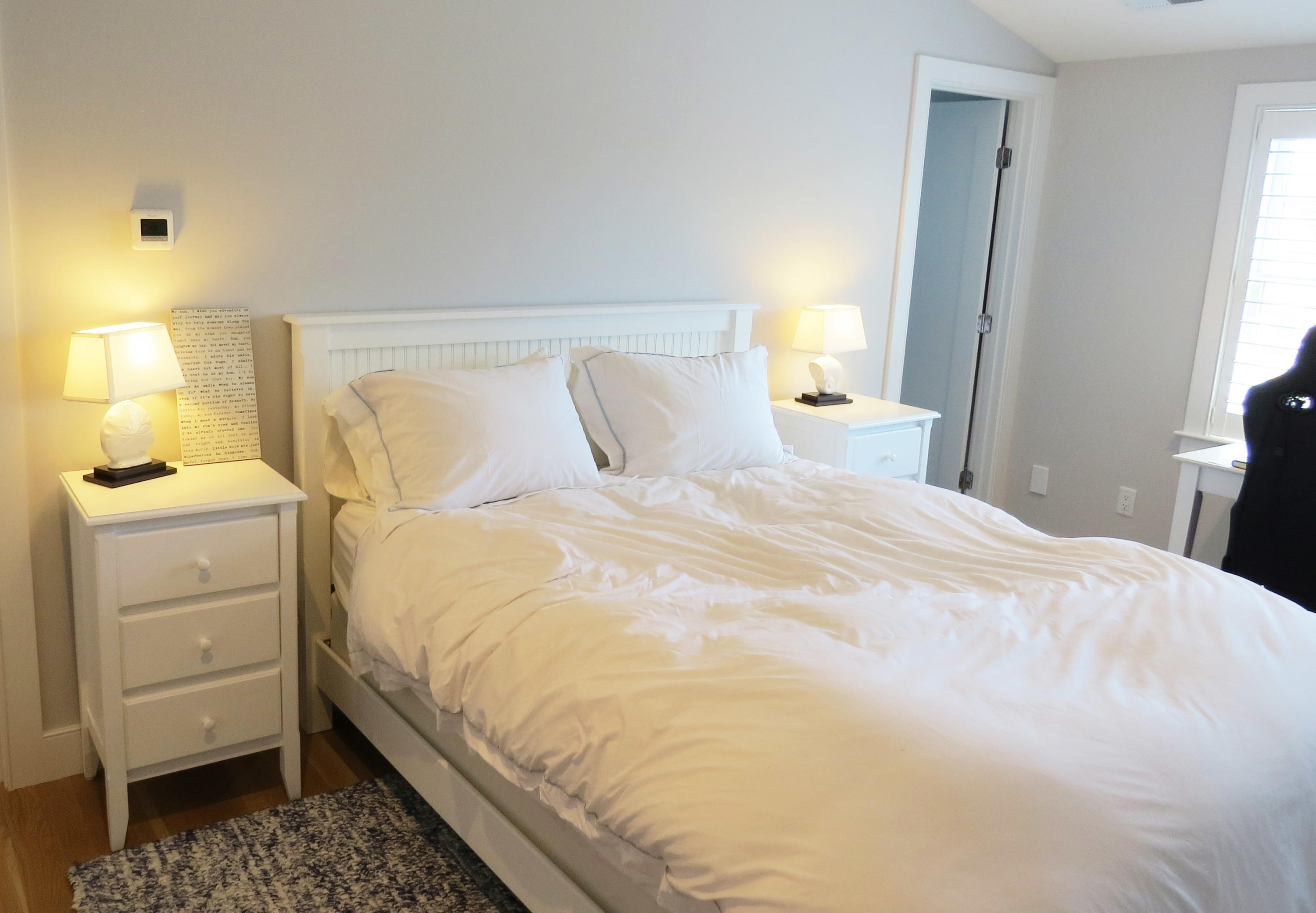 96 Hunter Rise Chatham, MA 02633 - Photo 9 of 37 a bedroom with a bed and a window