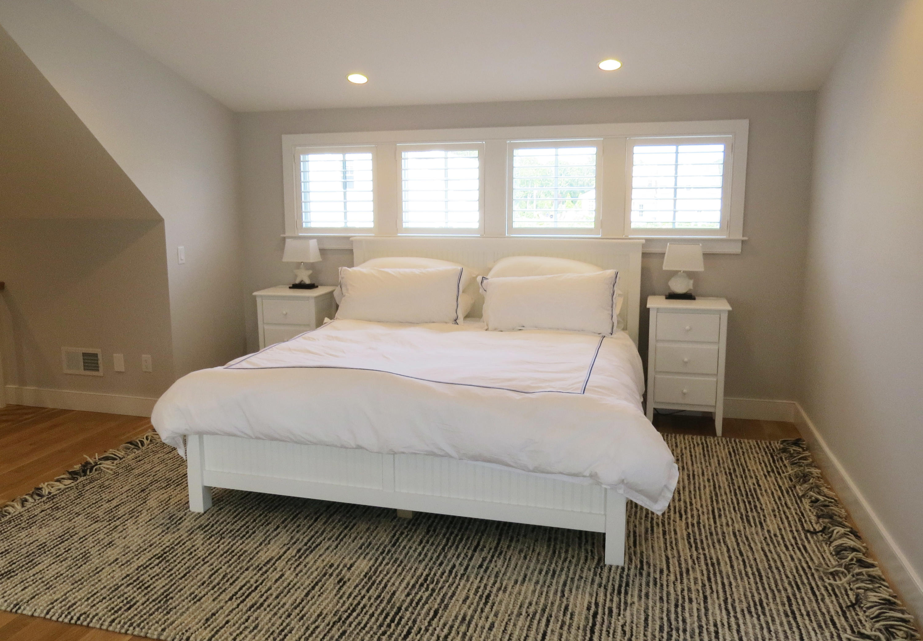 96 Hunter Rise Chatham, MA 02633 - Photo 10 of 37 a bedroom with a bed and window