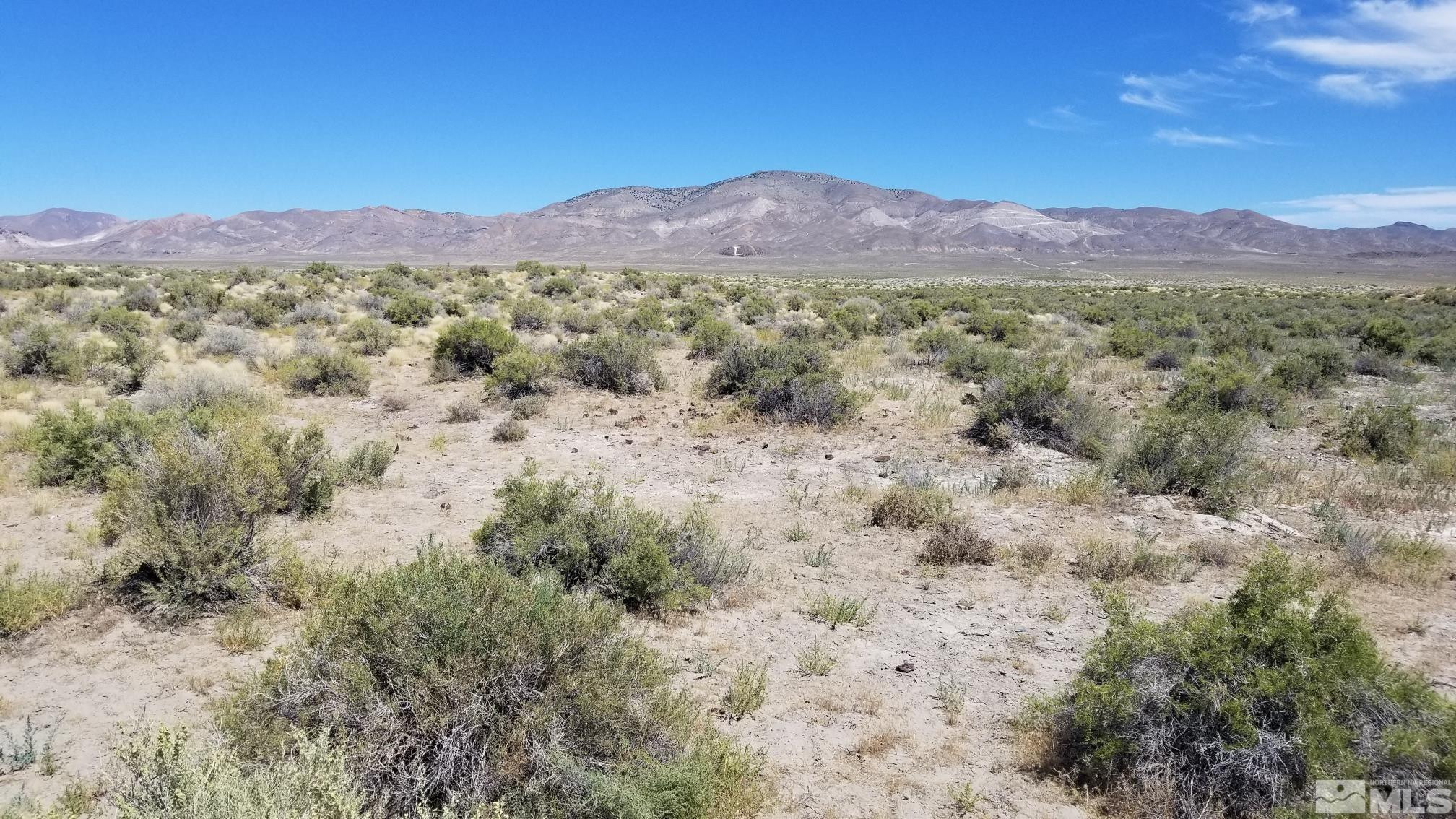 0 Airport Road Lovelock, NV 89419 - Photo 4 of 10 a view of a town with mountains in the background
