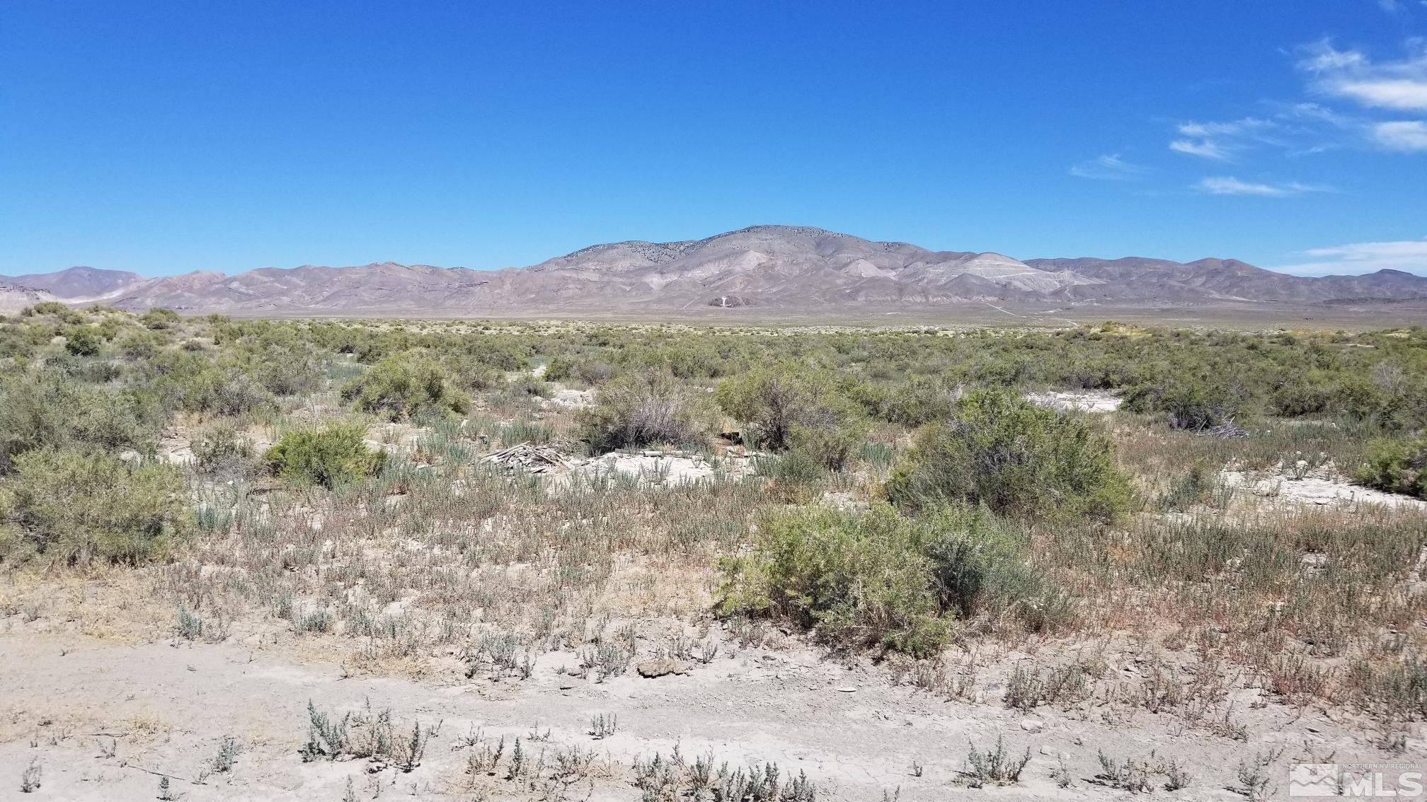 0 Airport Road Lovelock, NV 89419 - Photo 7 of 10 a view of a mountain range with trees in the background