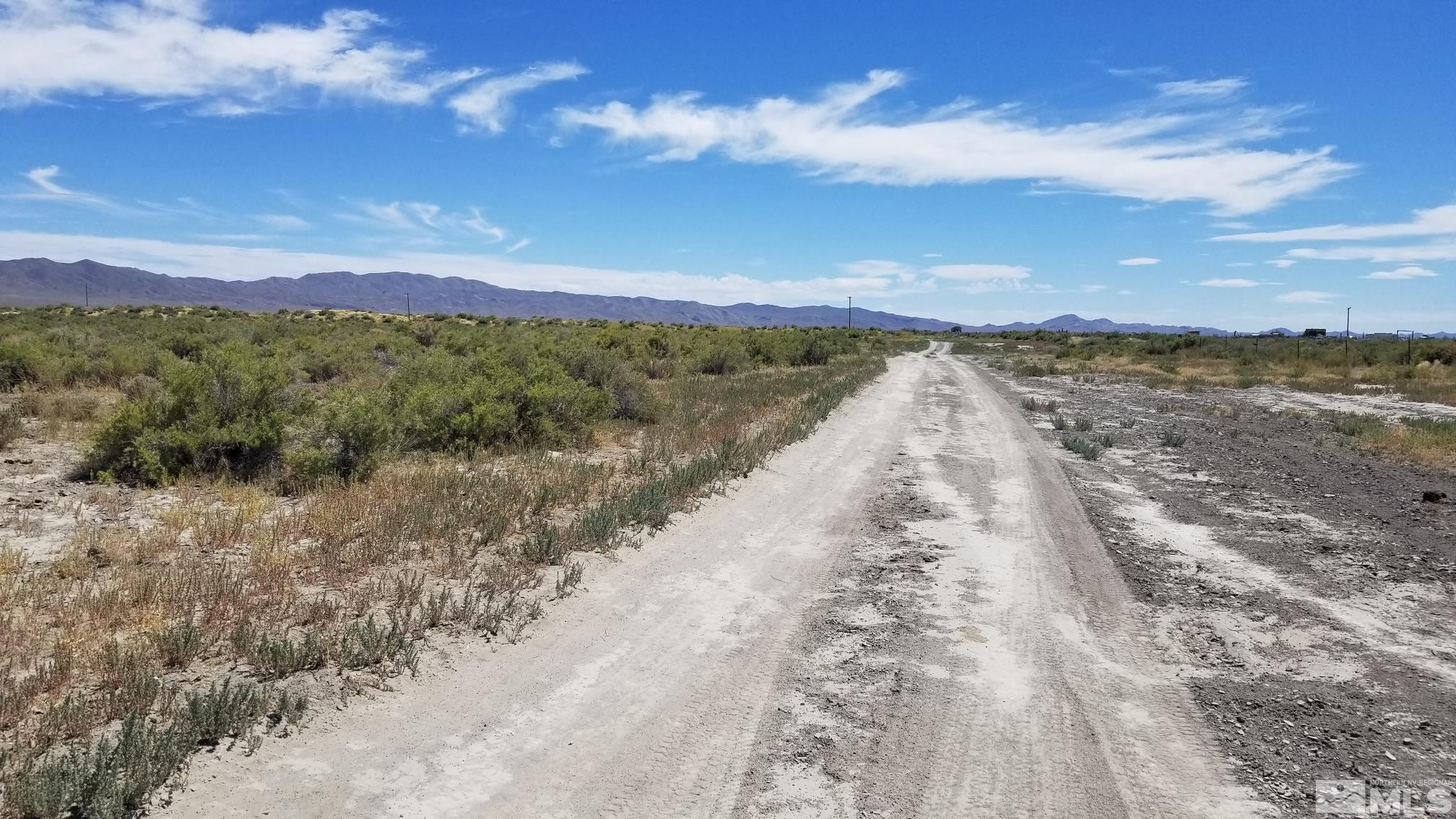0 Airport Road Lovelock, NV 89419 - Photo 9 of 10 a view of a lake with a mountain