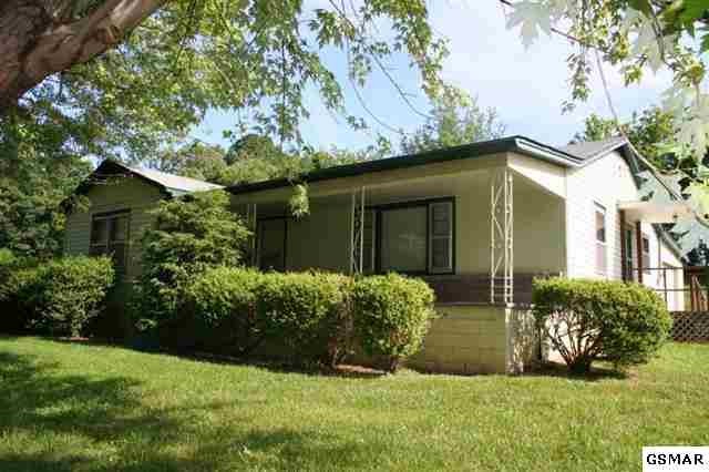 2429 Jones Cove Road Sevierville, TN 37876 - Photo 1 of 1 a front view of a house with a yard