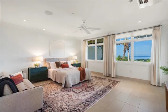 a bed room with furniture and window