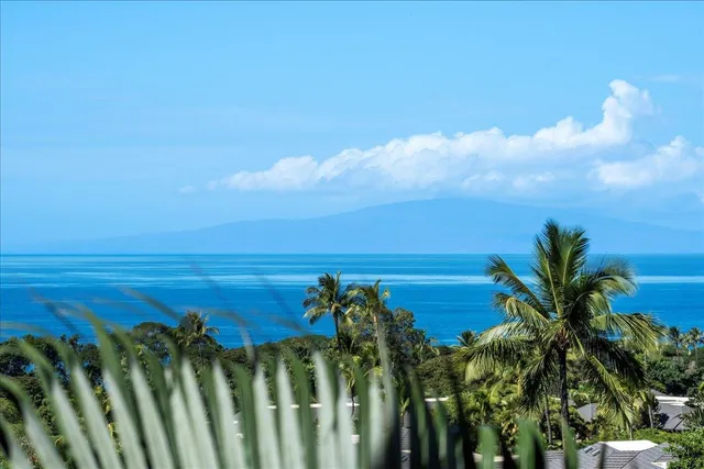 a view of a lake with a big yard