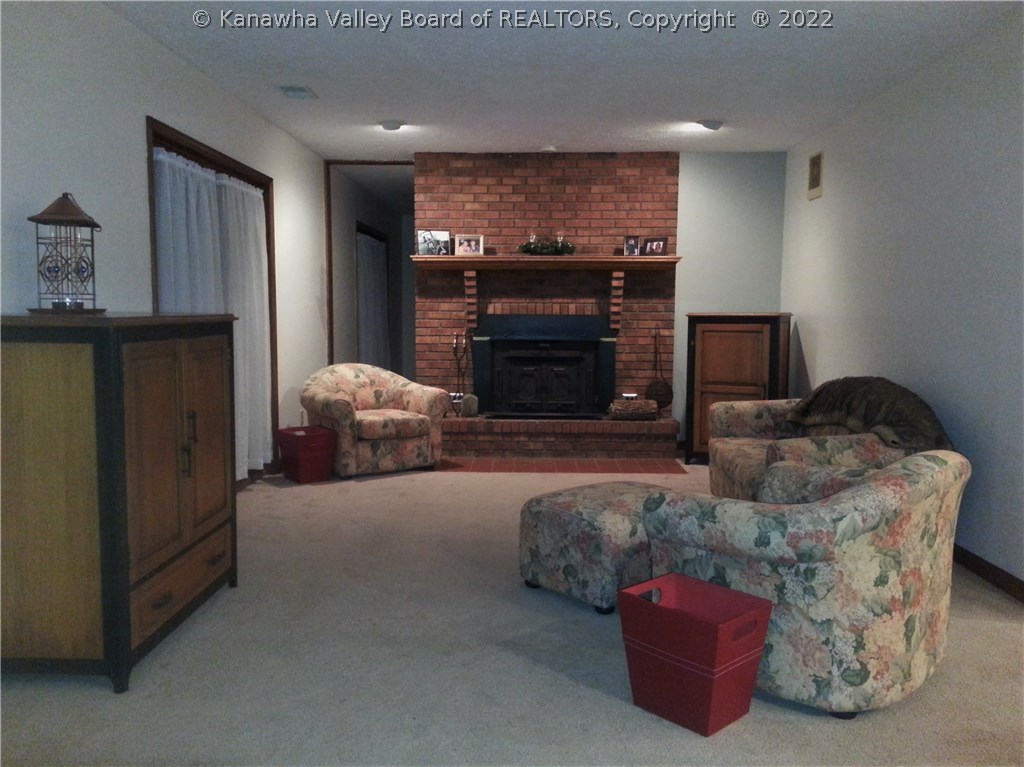 1672 Scott Depot Road Scott Depot, WV 25560 - Photo 8 of 23 Family Room with Wood Burning Fireplace