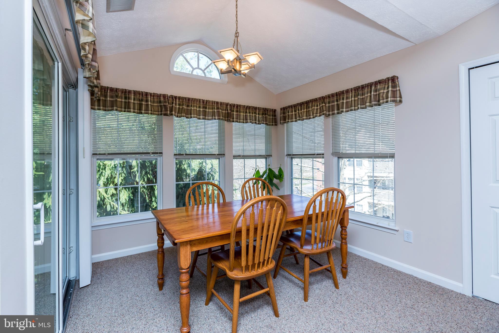 4888 Shellbark Road Owings Mills, MD 21117 - Photo 11 of 23 Dining area surrounded by windows