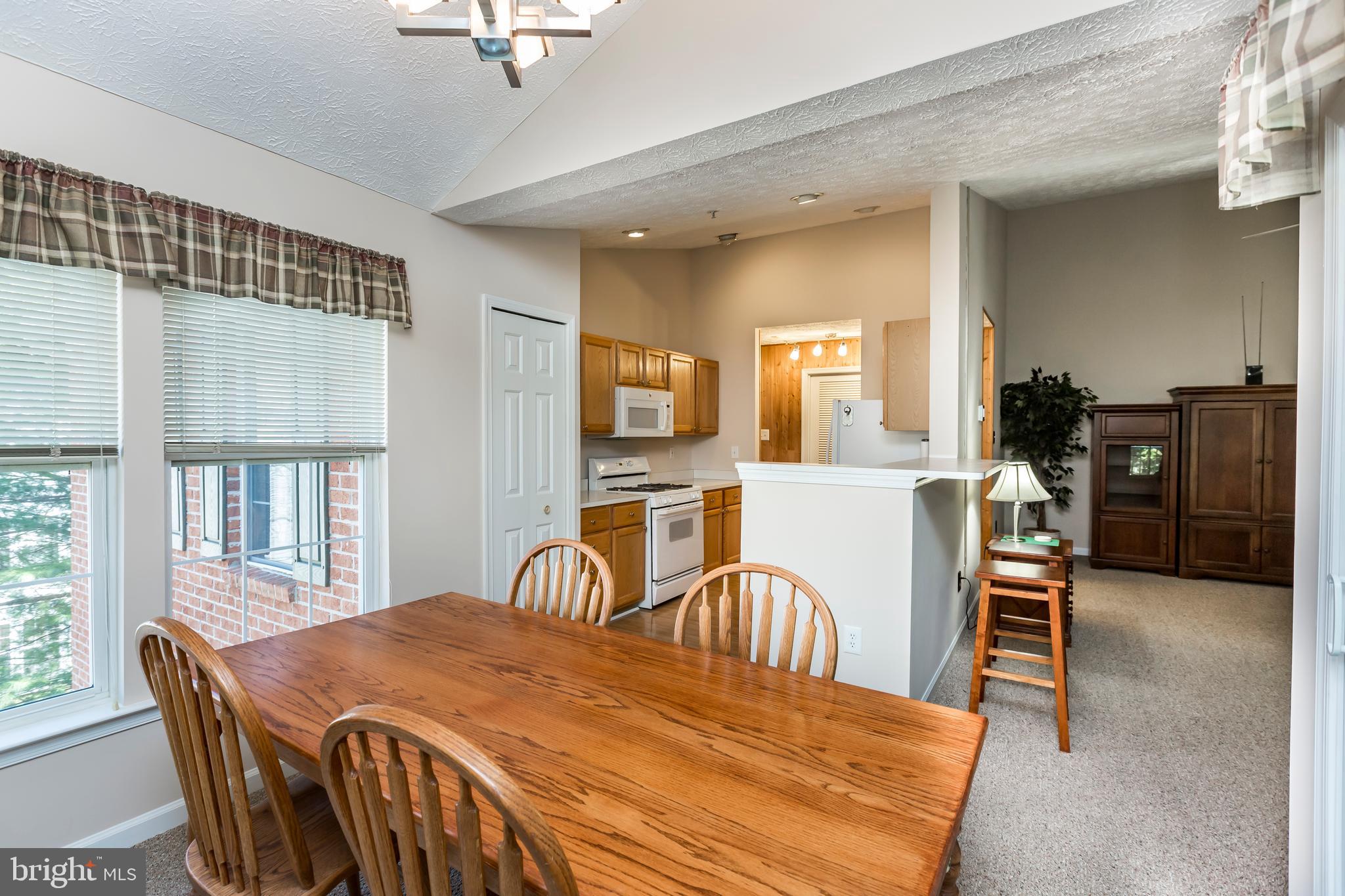4888 Shellbark Road Owings Mills, MD 21117 - Photo 13 of 23 Dining area looking into LR & Kitchen