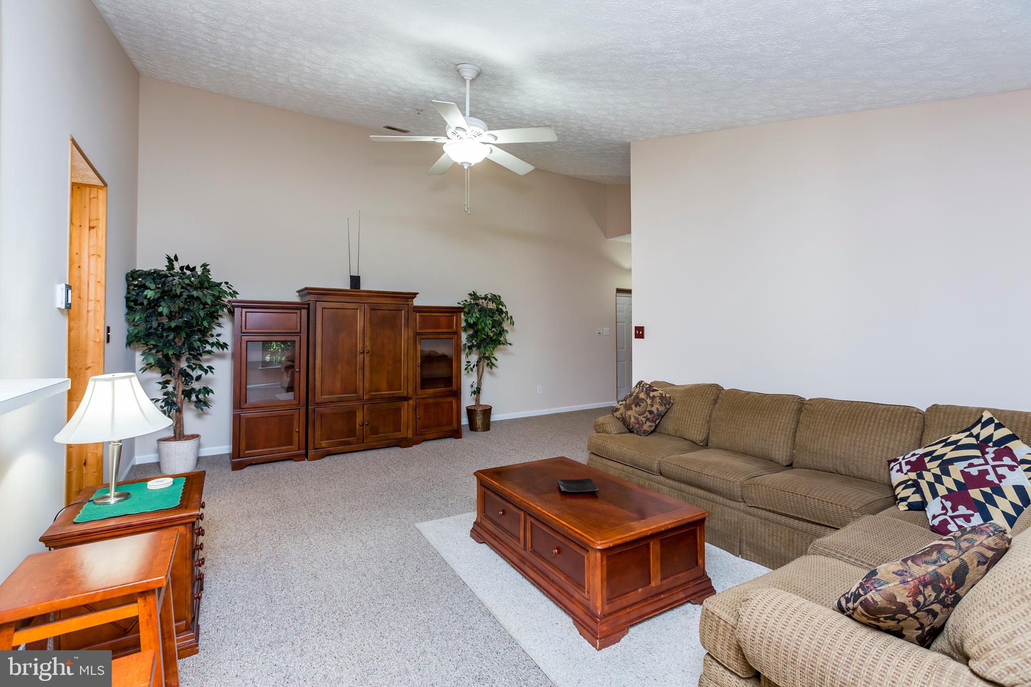 4888 Shellbark Road Owings Mills, MD 21117 - Photo 9 of 23 Living room w/ ceiling fan & vaulted ceiling