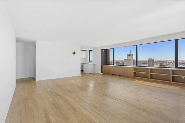 a view of a kitchen with furniture and cabinet