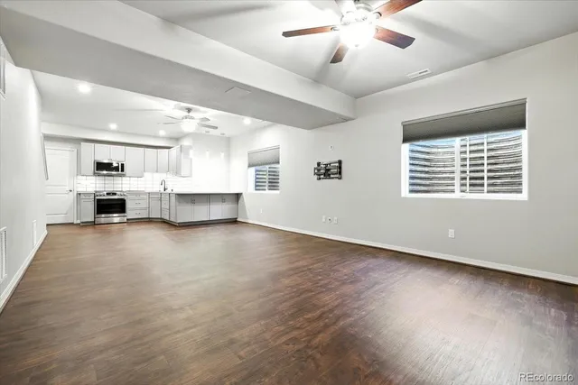 a view of kitchen and kitchen with sink